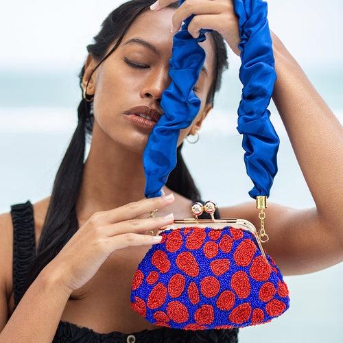 ARNOLDI Mandy Hand-beaded Clutch, in Savoy Blue & Red - The Higher Flower