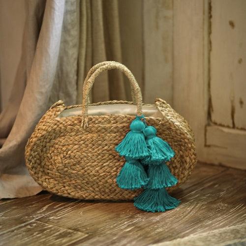 Oval Luna Straw Tote Bag - with Cerulean Blue Tassels - The Higher Flower